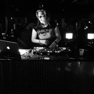 DJ Selina Style at the controller, black and white